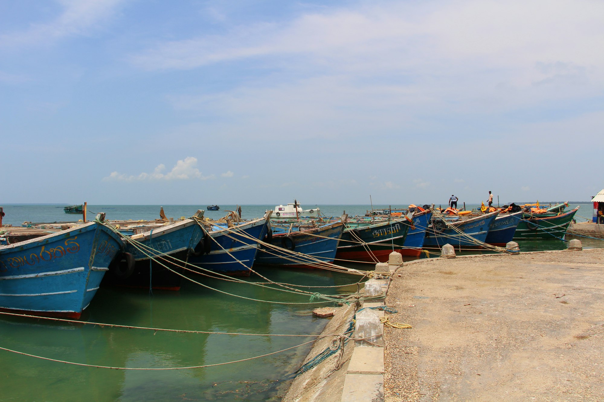 Fishing boats drawn up on the sand on the northern coast